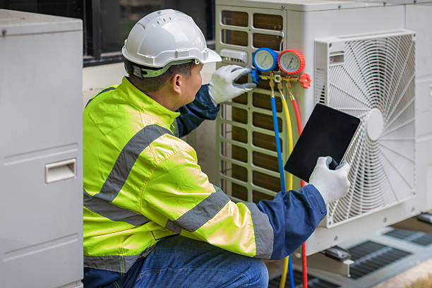 Professional Hvac technician working in Spencerville, MD